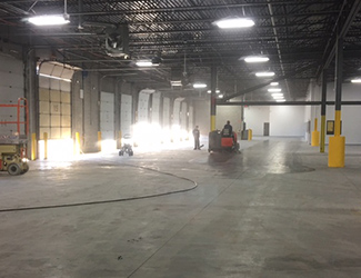 Large warehouse getting cleaning